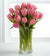 10 Pink Tulips In Glass Vase- - Send Flowers to India -This beautiful arrangement consists of: 10 pink tulips Crystal clear glass vase Note: This product is available for delivery in Bangalore city only. 