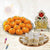 Special Magic Treat- Midnight Flower Delivery in Occasion | Diwali | Diwali Sweets To UK -This Diwali Special gift contains: Kaju Katli -250 gms Ganesh Laxmi Mandap Motichur Laddu -250 gms Note:The photos are indicative. Occasionally, we may need to substitute products with equal or higher value due to temporary and/or regional unavailability issues This is a courier product that may arrive in 2-5 business days from placing order. 