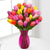 20 Mixed Tulips Premium Arrangement- - for Midnight Flower Delivery in India -This beautiful arrangement consists of: 20 mixed color tulips Crystal clear big glass vase Note: This product is available for delivery in Bangalore city only. 