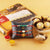 Astonishing Rakhi Gift- - Send Flowers to India -This Rakhi combo gift contains: Three Beautiful Rakhi Kaju Katli - 300 gms Personalize Message/ card Ferrero Rocher - 15 Pieces Note: Sweets will be branded pack from Haldiram/Bikano/Vadilal or similar (as per availability)The photos are indicative. Occasionally, we may need to substitute products with equal or higher value due to temporary and/or regional unavailability issues This is a courier product that may arrive in 2-5 business days from placing order 