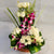 Basket Of Sensation- Online Flower Delivery In Category | Flowers | Premium Flowers -This Beautiful arrangement consists of 4 Stem Fresh Purple Orchids 25 Pices White Rose Nicely Arranged in a beautiful Basket with seasonal leaves fillers Note: While we always strive to ensure that products are accurately represented in our photographs, from season to season and subject to availability, our florists may be required to substitute one or more flowers for a variety of equal or greater quality, appearance and value. Also for cakes, Actual design and arrangement might differ based on chef, seasonal elements and ingredient availability. 