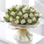Love For Mother - White Rose Flower Bouquet- - for Online Flower Delivery In India - Product Details: 30 White Roses White Paper Packing White Ribbon Bow Seasonal Fillers Roses are best known for freshness and fragrance, and to pass the freshness and fragrance to your loved one on special events, we are offering a bouquet of 40 white farm fresh roses nicely wrapped in a white paper packing. So place your order now and make your beloved day more special.     While we always strive to ensure that products are accurately represented in our photographs, from season to season and subject to availability, our florists may be required to substitute one or more flowers for a variety of equal or greater quality, appearance and value.   