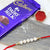 Lavish Rakhi Surprising Gift For Brother- Online Flower Delivery In Occasion | Rakhi | Rakhi To New Zealand -This Rakhi combo gift contains: One Beautiful Rakhi Dairy Milk Note: The photos are indicative. Occasionally, we may need to substitute products with equal or higher value due to temporary and/or regional unavailability issues This is a courier product that may arrive in 2-5 business days from placing order 