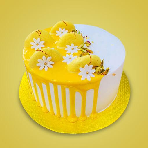 Mouth Watering Yellowish Rasmalai Cake - for Flower Delivery in India 
