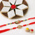 Multicolored Rakhi N Kaju Katli Combo Gift- Flower Delivery in Occasion | Rakhi | Rakhi & Sweets To UAE -This Rakhi combo gift contains: Two Beautiful Rakhi Kaju Katli - 200 gms Personalize Message/ card Note: Sweets will be branded pack from Haldiram/Bikano/Vadilal or similar (as per availability)The photos are indicative. Occasionally, we may need to substitute products with equal or higher value due to temporary and/or regional unavailability issues This is a courier product that may arrive in 2-5 business days from placing order 