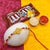 Tempting Rakhi Surprise Gift--This Rakhi combo gift contains: One Beautiful Rakhi M& M's Chocolate Note:The photos are indicative. Occasionally, we may need to substitute products with equal or higher value due to temporary and/or regional unavailability issues This is a courier product that may arrive in 2-5 business days from placing order 