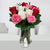 Alluring Roses In Vase--This special flower vase arrangement consists of: 12 Mix roses Crystal Clear Vase Seasonal fillers   While we always strive to ensure that products are accurately represented in our photographs, from season to season and subject to availability, our florists may be required to substitute one or more flowers for a variety of equal or greater quality, appearance and value. 