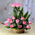 Anonymous Love - 20 Roses In Basket- Best Flower Delivery in Category | Flowers | Thank You Flowers -Product Details: 20 Pink Roses Cane Basket Seasonal Fillers We all want a basket of happiness and joy, and on our special events, we present a gift which is a symbol of happiness and joy, and to fulfill that spirit, we have a bouquet of 20 farm fresh pink roses nicely placed in a basket. While we always strive to ensure that products are accurately represented in our photographs, from season to season and subject to availability, our florists may be required to substitute one or more flowers for a variety of equal or greater quality, appearance and value. 