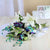 Beauty In Blue- - for Midnight Flower Delivery in India -This beautiful flower bouquet consists of: 5 Blue orchids 3 White Oriental lilies White ribbon bow 