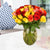 Colorful Roses In Vase- Flower Delivery in Bangalore Shanthinagar -This special flower vase arrangement consists of: 40 Mix roses Crystal Clear Vase Seasonal fillers 