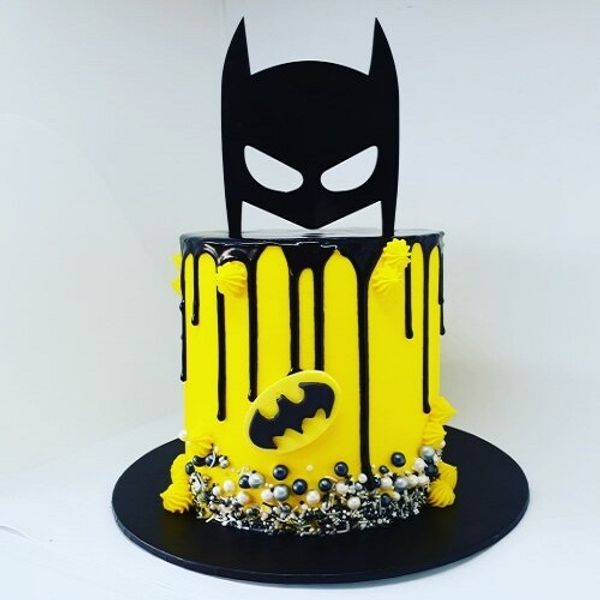 Yellow Black Theme Cake With Batman Face Mask