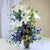 Fabulous Love- - for Midnight Flower Delivery in India -This beautiful flower bouquet consists of: 10 Blue orchids 3 White Oriental lilies Glass Vase Seasonal fillers 