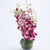 Sweet Floral- - for Flower Delivery in India -This Mother's Day Special flower contains : 10 Stem Purple Orchids Nicely arranged in a vase While we always strive to ensure that products are accurately represented in our photographs, from season to season and subject to availability, our florists may be required to substitute one or more flowers for a variety of equal or greater quality, appearance and value. 