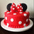 Red Minnie Mouse Cake- Online Cake Delivery In Category | Cakes | Mickey Mouse Cakes -This delicious custom theme cake contains: 1 KG minnie mouse cake Vanilla flavor (Or any other flavor of your choice) Note: The photos are indicative only. Actual design and arrangement might differ based on chef, seasonal elements and ingredient availability. 