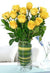 Yellow Roses Bouquet- - from Best Flower Delivery in India - Product Details: 12 Yellow Roses Vase Seasonal Leaves and Fillers Gift your loved one this bundle of 10 elegantly arranged Yellow roses in a vase and make your loved one for a special fee. The number of roses in this flower arrangement is 10 and is ideal to be gifted on any occasion or event to your near and dear ones. Buy them now! While we always strive to ensure that products are accurately represented in our photographs, from season to season and subject to availability, our florists may be required to substitute one or more flowers for a variety of equal or greater quality, appearance and value.   
