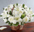 Peaceful White Basket- - for Online Flower Delivery In India -This beautiful flower arrangement contains: 6 White Asiatic Lily 20 White Carnation 15 White Rose Seasonal fillers Beautiful Basket   Some of the Lilies may arrive in bud form, ready to bloom into full beauty in 2-4 days. Lily color will be replaced with best available color of equal value. While we always strive to ensure that products are accurately represented in our photographs, from season to season and subject to availability, our florists may be required to substitute one or more flowers for a variety of equal or greater quality, appearance and value. 
