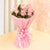 Pink Fantasy - 8 Roses Bouquet- Midnight Flower Delivery in Subcategory | Flowers | Roses | Chennai -Product Details: 8 Pink Roses Pink Paper Wrapping Pink Ribbon Bow Seasonal Fillers Show your love to your friends and loved ones with this delightful and charming bunch of Yellow roses. This charming bunch of pink roses is suitable for all occasions. Bring a smile on the face of your loved ones by gifting 8 pink roses wrapped in pink paper packing.   While we always strive to ensure that products are accurately represented in our photographs, from season to season and subject to availability, our florists may be required to substitute one or more flowers for a variety of equal or greater quality, appearance and value.   