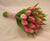 Pink Tulip Bunch- Best Flower Delivery in Category | Flowers | Imported Flowers -This beautiful bouquet consists of: 10 pink tulips Simple wrap using natural tapes. Note: This product is available for delivery in Bangalore city only. 