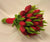 Red Beauty Tulips- Send Flowers to Category | Flowers | Imported Flowers -This beautiful bouquet consists of: 10 red tulips Simple wrapping with red tape Note: This product is available for delivery in Bangalore city only. 