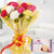 Sweet Life- Send Flowers to Category | Flowers | Midnight Flower Delivery -This beautiful combo consists of: 10 mix carnations wrapped in yellow cellophane paper Red and yellow ribbon bow Half Kg Soan Papdi 