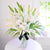 White Silk- Midnight Flower Delivery in Occasion | Valentines Day | Lilies -This fresh and beautiful arrangement consists of: 5 White Oriental lilies Glass Vase Seasonal fillers 