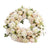 Wreath For Condolence--This special flower arrangement consists of: 80 Fresh White Rose Seasonal fillers While we always strive to ensure that products are accurately represented in our photographs, from season to season and subject to availability, our florists may be required to substitute one or more flowers for a variety of equal or greater quality, appearance and value. 